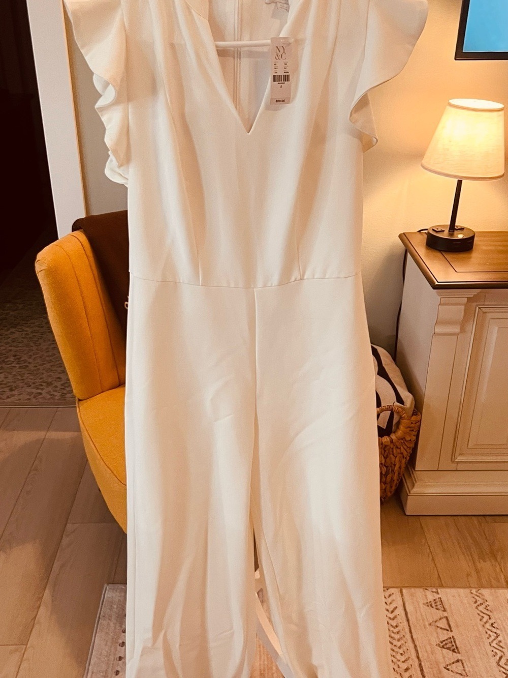 New York & Company Cream V-Neck Flutter-Sleeve Jumpsuit